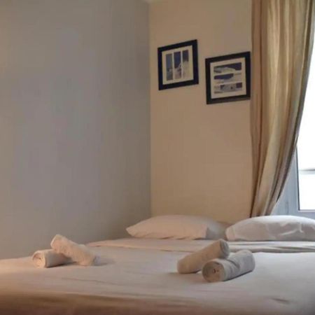 Charming Apartment Near The Eiffel Tower ปารีส ภายนอก รูปภาพ