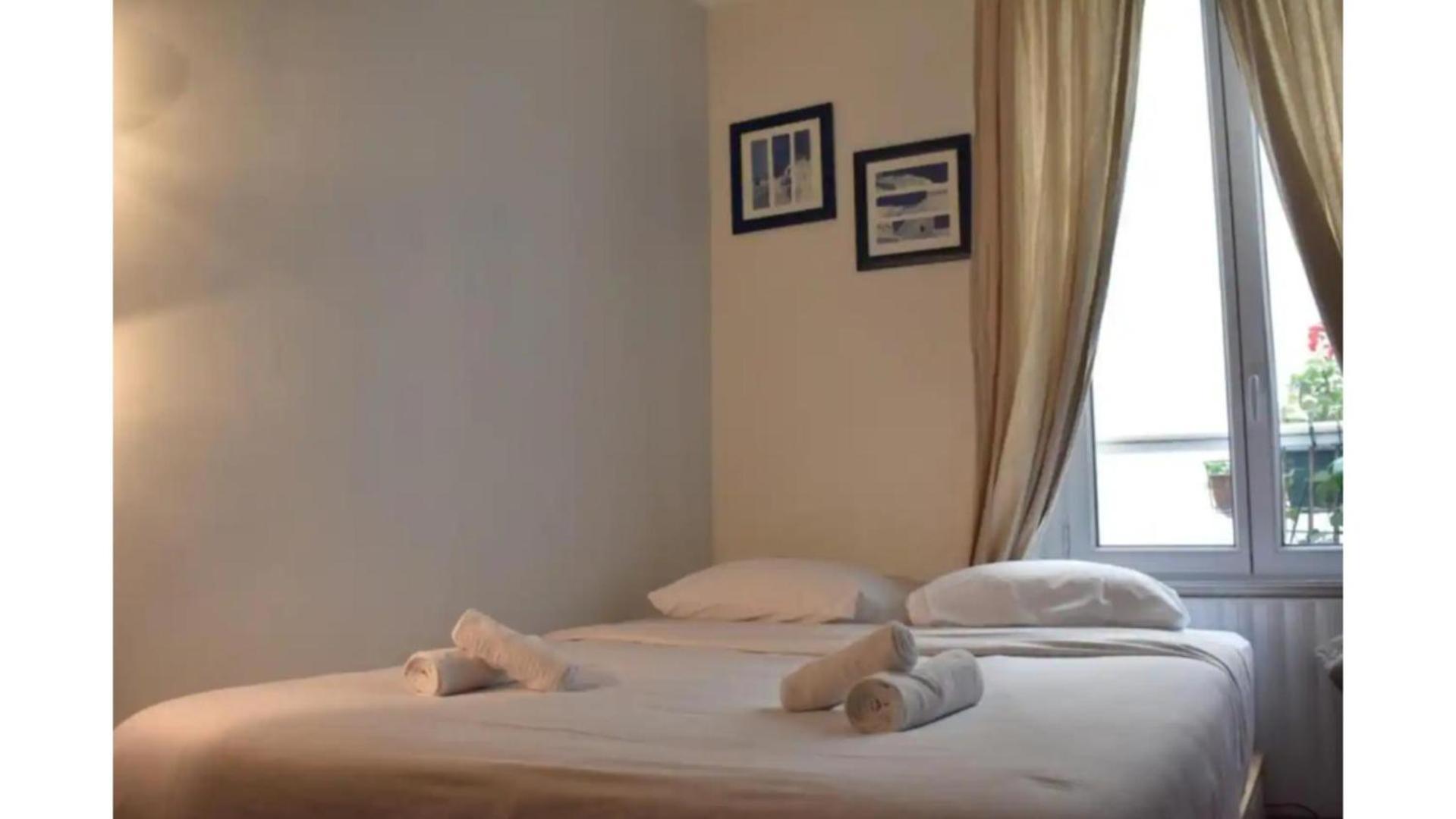 Charming Apartment Near The Eiffel Tower ปารีส ภายนอก รูปภาพ