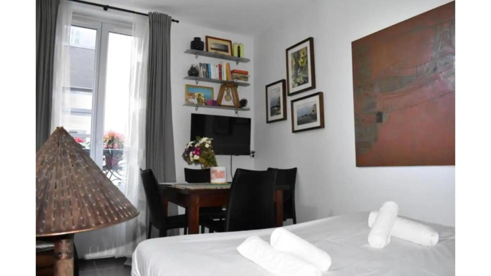 Charming Apartment Near The Eiffel Tower ปารีส ภายนอก รูปภาพ