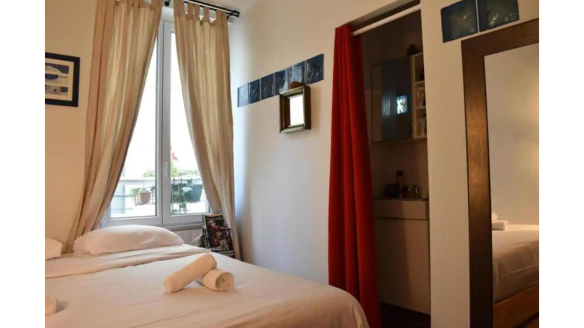 Charming Apartment Near The Eiffel Tower ปารีส ภายนอก รูปภาพ